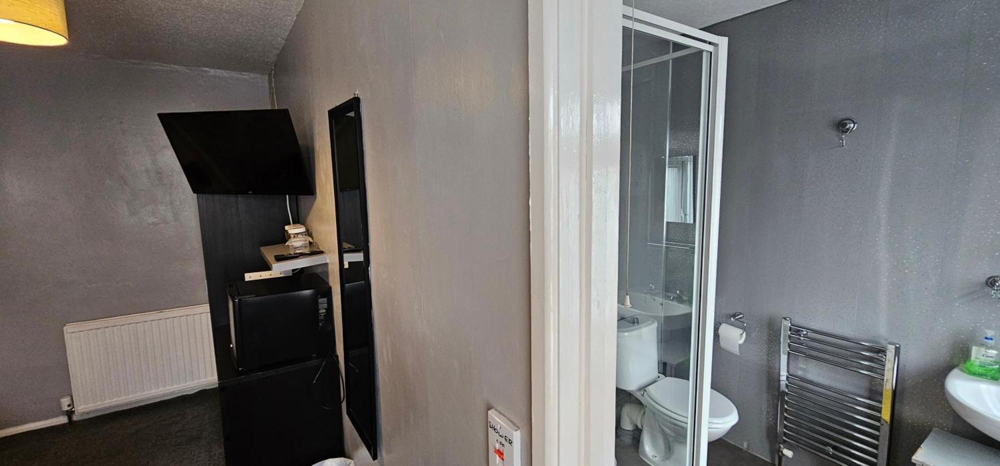 The Roslyn Guest House ペイントン 部屋 写真