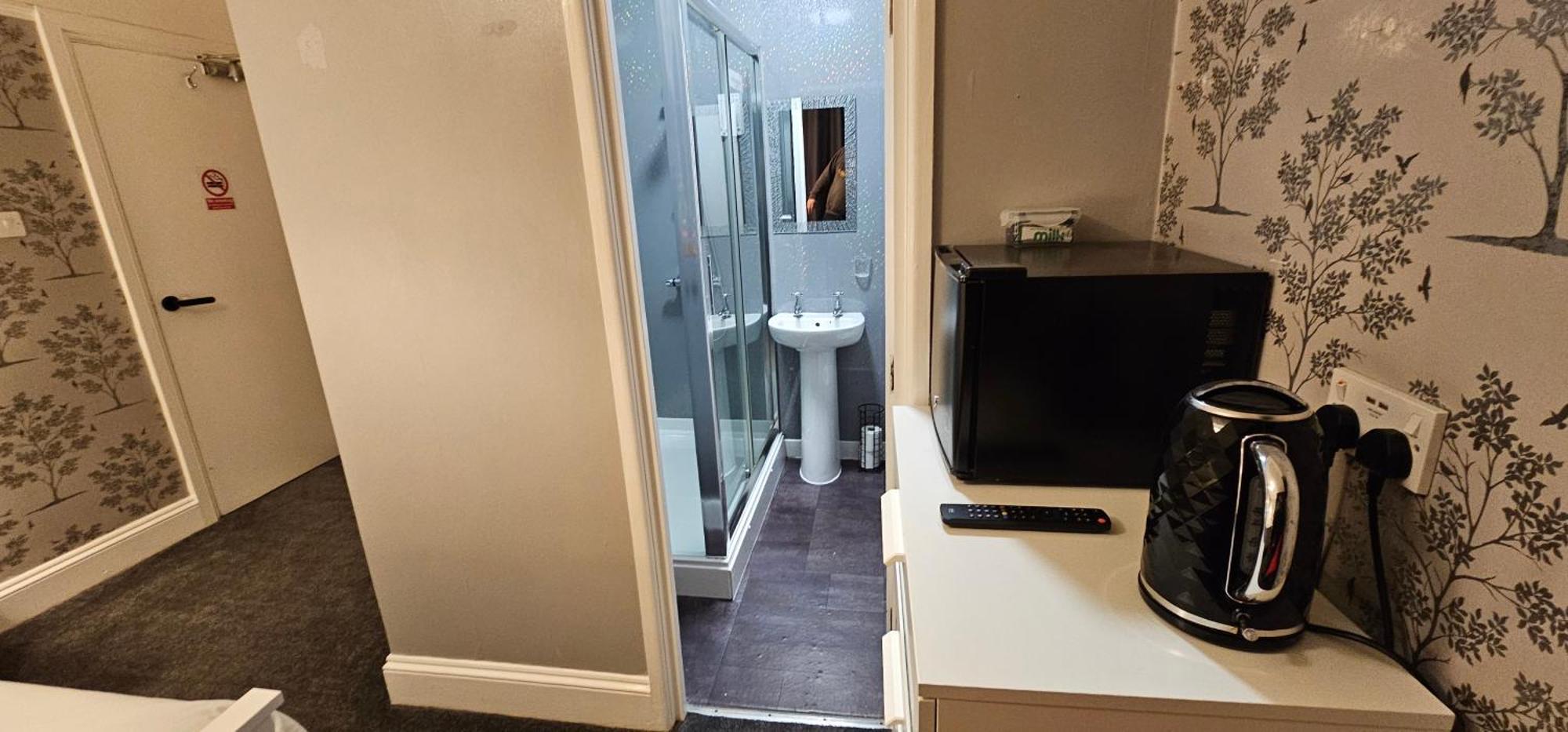 The Roslyn Guest House ペイントン 部屋 写真